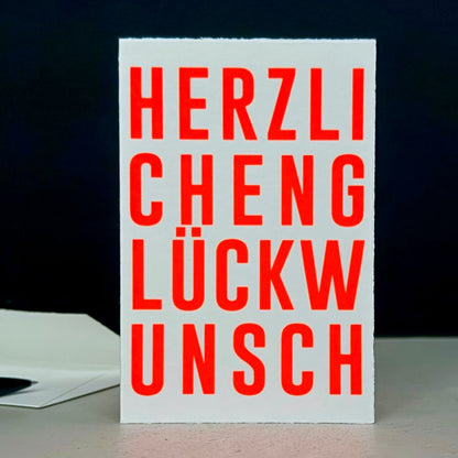Weiße Glückwunschkarte mit Siebdruck in Neon Rot